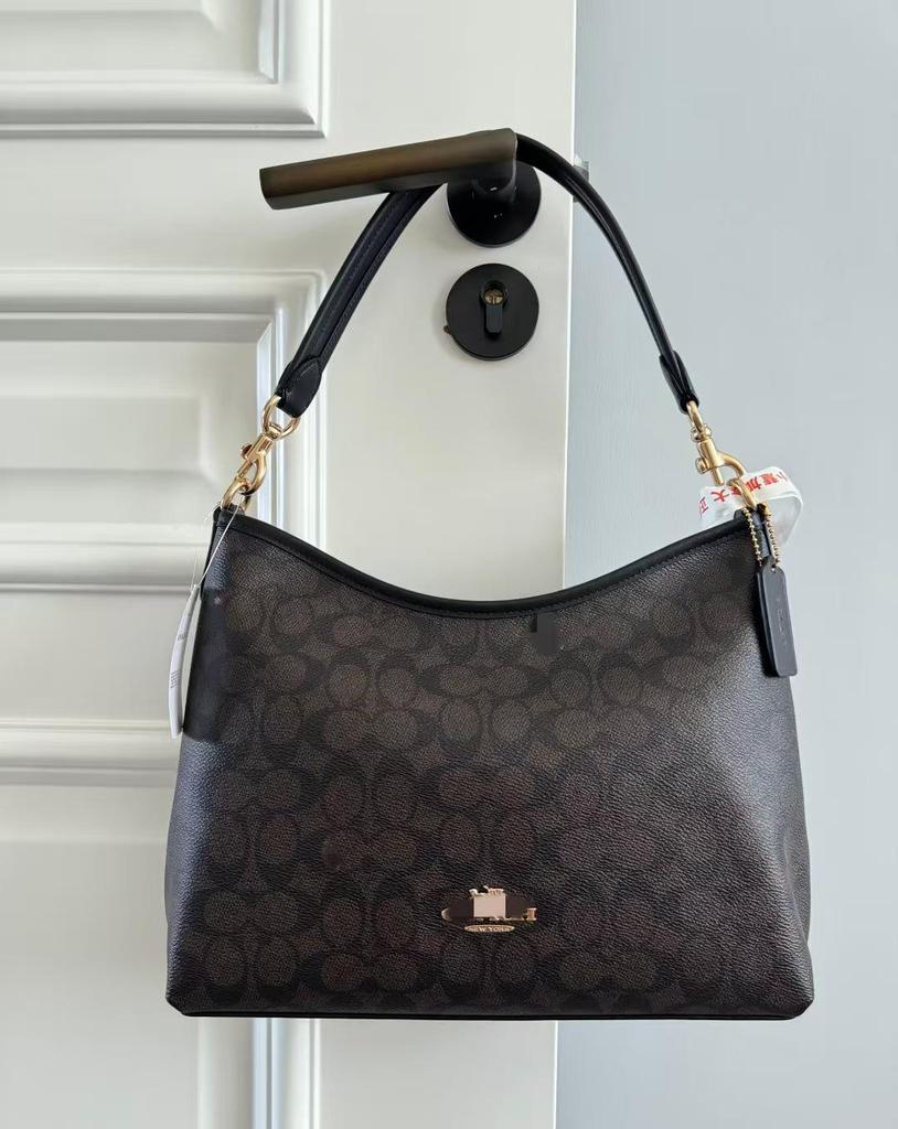 Coach Laurel Hobo Bag: Versatile, Large-Capacity Shoulder, Crossbody, and Handbag for Women.