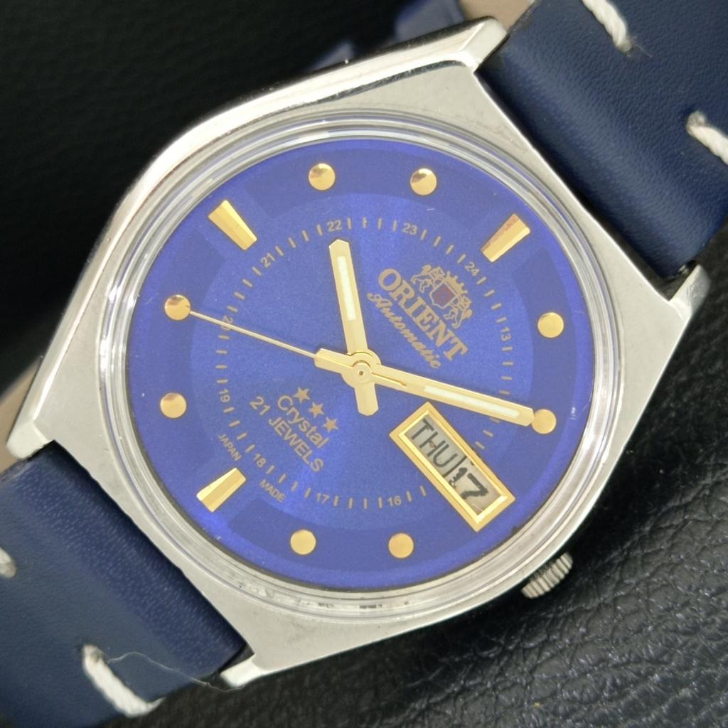 

VINTAGE ORIENT CRYSTAL AUTOMATIC 46941 JAPAN MENS BLUE DIAL WATCH a706886-1
