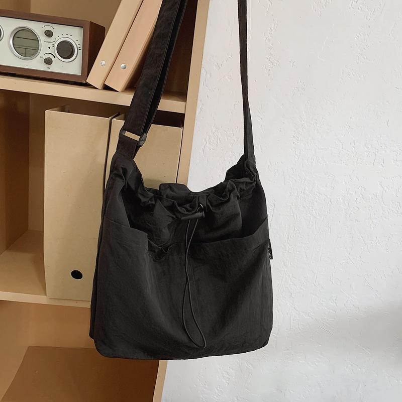 

Cloth bag women s large-capacity new summer versatile shoulder messenger bag premium bucket bag чёрный