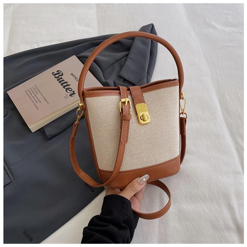 

Niche retro bag women s new high-end versatile portable bucket bag splicing shoulder messenger bag small коричневий