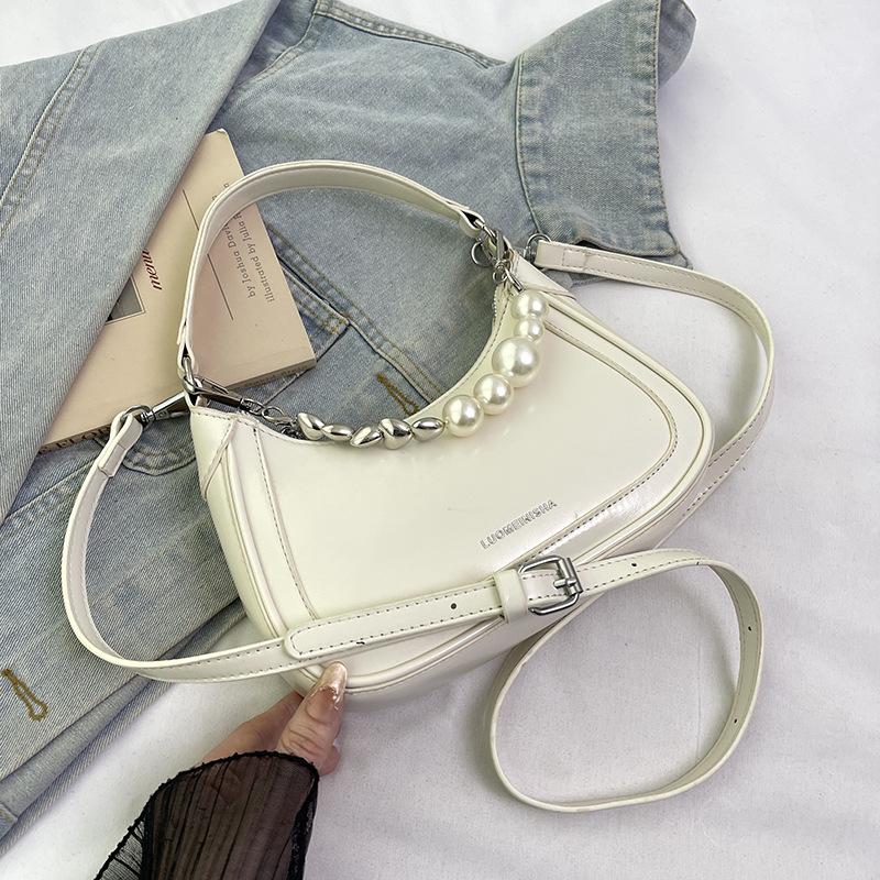 Модная белая подмышечная сумка женская новая высококлассная атмосферная нишевая высокая ценность косой наклон портативная маленькая сумка