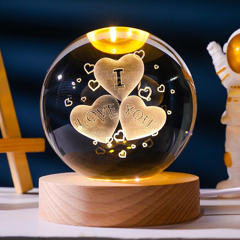 Flickering Crystal Ball Night Light with Engraved Solid Wood Base - Perfect as a Birthday Gift or Creative Graduation Ornament.