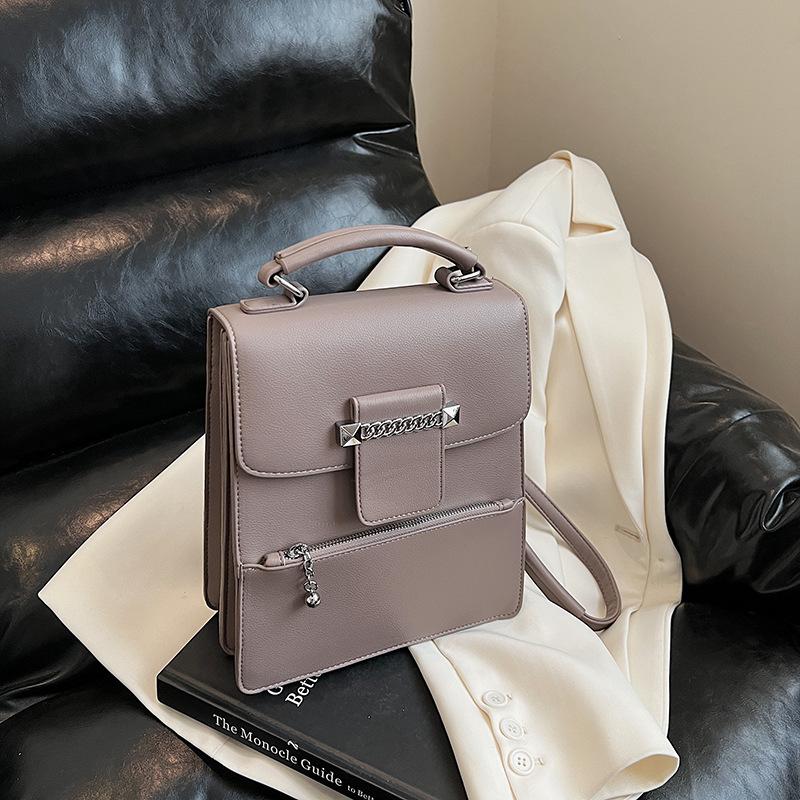 

New fashionable solid color women s handbag large capacity high sense niche shoulder messenger bag чорний