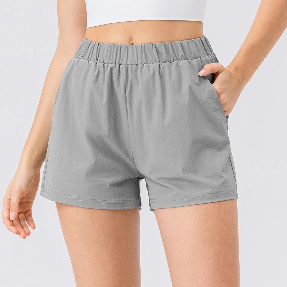 Nuovi Pantaloncini da Yoga Nudi Stampati da Donna con Tasche Delicati sulla Pelle Aderenti Elastici ad Asciugatura Rapida Pantaloncini Sportivi e per il Fitness