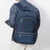 Einfarbiger Rucksack mit mehreren Reißverschlusstaschen und seitlichen Netztaschen, ideal für Schule und Reisen