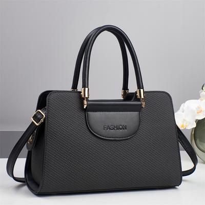 Die neue Mode Canvas Textur Macaron Mode Handtasche Hoher Erscheinungsgrad Einfache Schultertasche All Match Damentasche