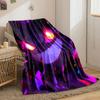 Glowing purple and orange face with sharp teeth and fiery accents. for all seasons blanket lunch break throw gift