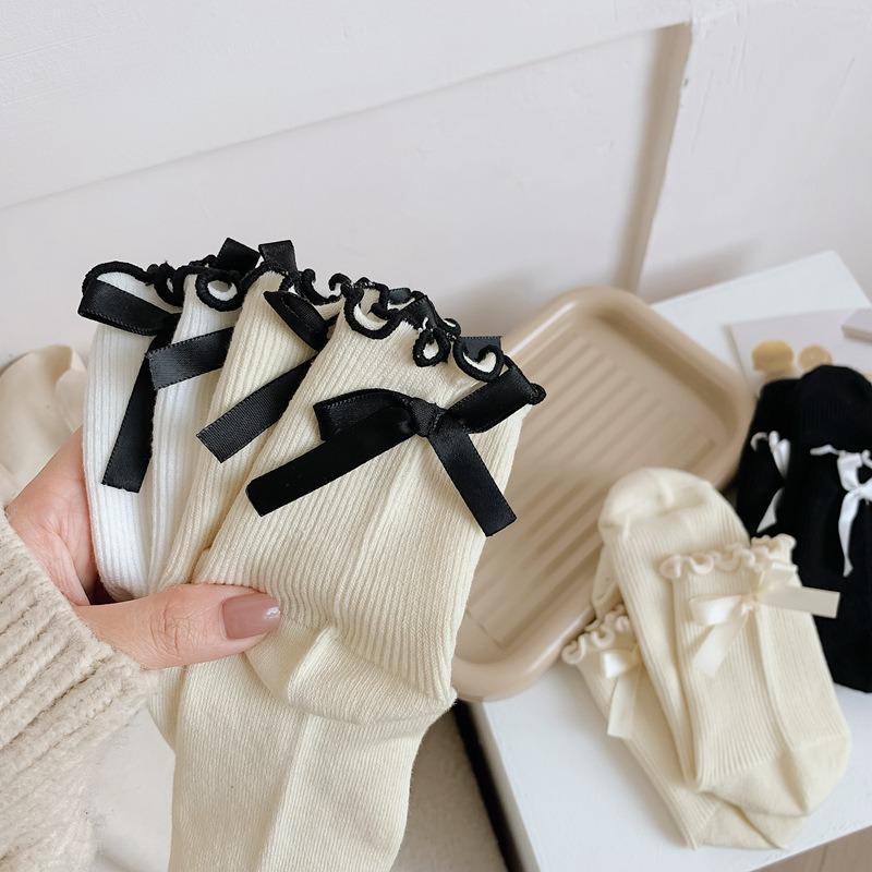 

Japanese JK Sweet Bowknot Tied Middle Tube Socks Women Heel Bow Casual Black White Pile Socks Girls Sports Cotton Socks One Size