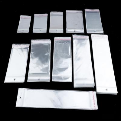 100 Stück transparente selbstklebende Kunststoff-Aufbewahrungsbeutel aus OPP-Poly-Pack mit Aufhängeloch für Einzelhandelsverpackungen