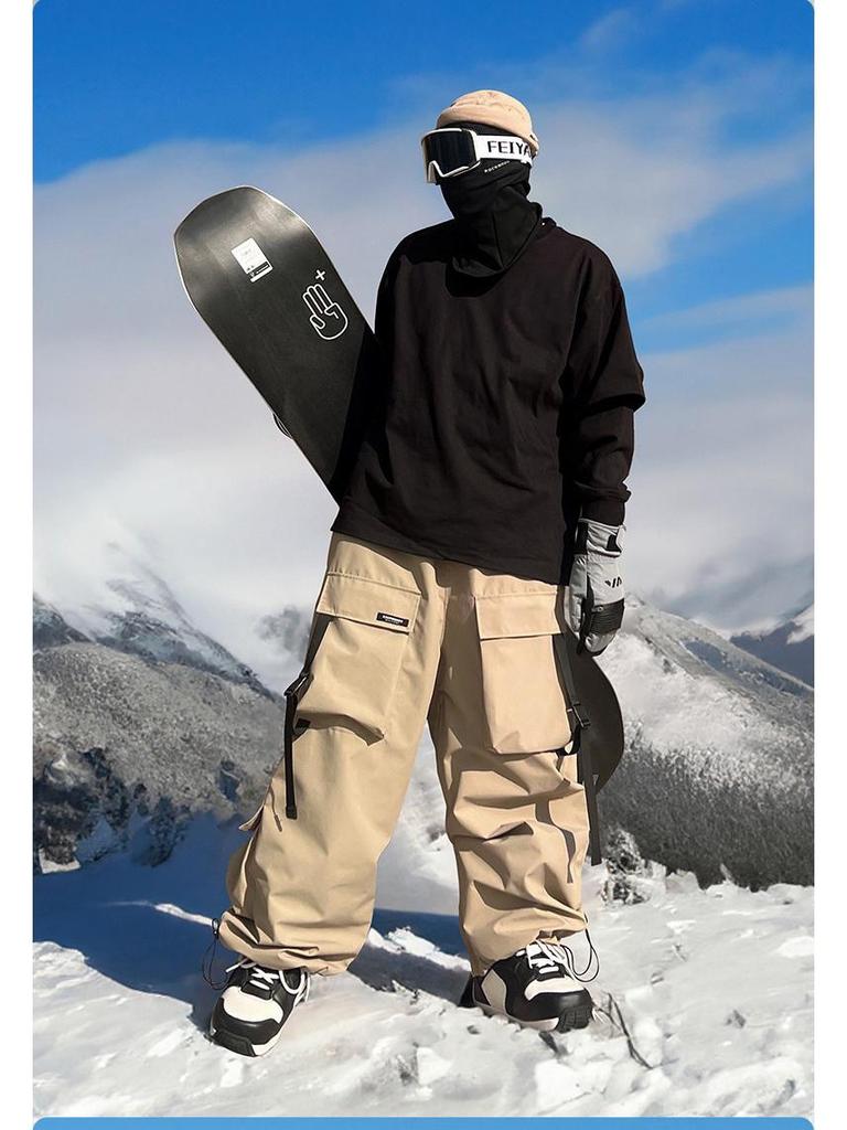 Wodoodporny kombinezon narciarski Xuexiang z wieloma kieszeniami - Grube, ciepłe spodnie śnieżne dla mężczyzn i kobiet