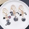Dripping Oil Cartoon Black Cat Keychain Pendant: Cute Zinc Alloy Backpack Ornament In 6 Styles