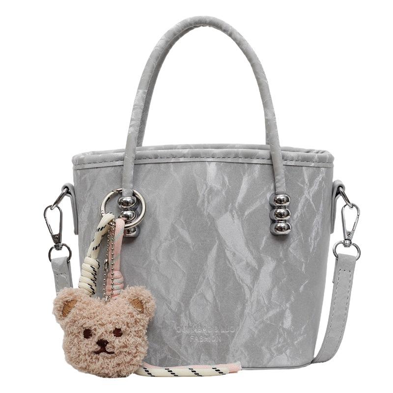 

Популярная в этом году женская сумка 2025 новая весенне-летняя сумка-мессенджер модная универсальная сумка-ведро серебряный