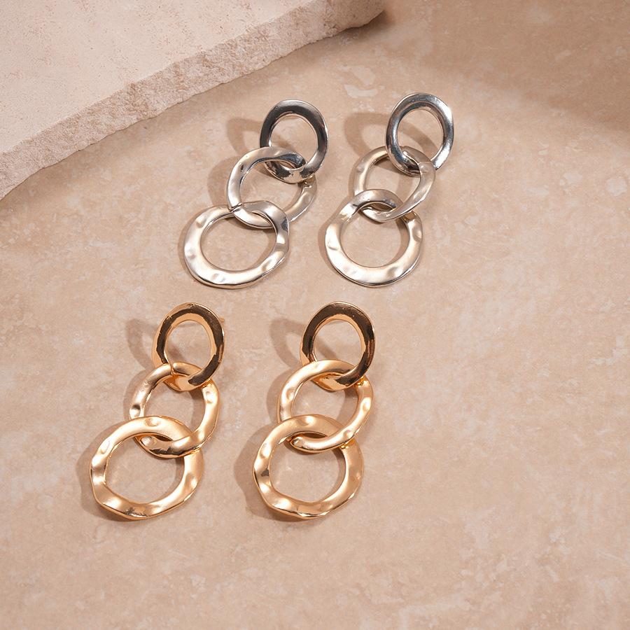 Metal pleated geometric round silver needle earrings niche cold wind earrings