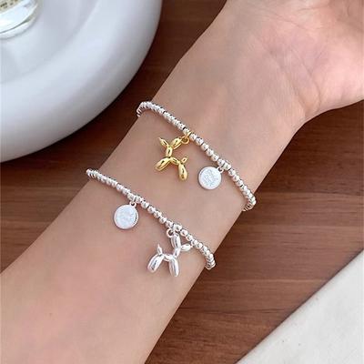 Versão coreana de cachorro balão fofo S pulseira cor contrastante dourada e prateada marca redonda da sorte pulseira elástica pulseira pulseira joia