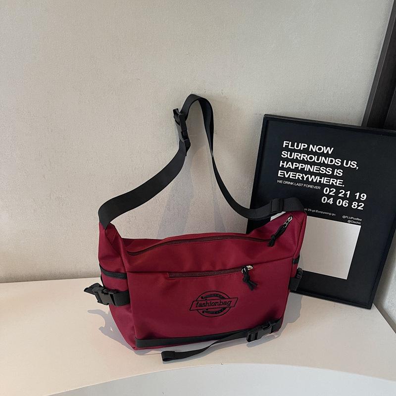 New trendy shoulder bag men's casual versatile messenger bag class large capacity light commuter mailman backpack women