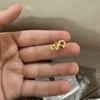 Grillz dentale a forma di cuore traforato placcato oro 18 carati, gioiello personalizzato per denti.