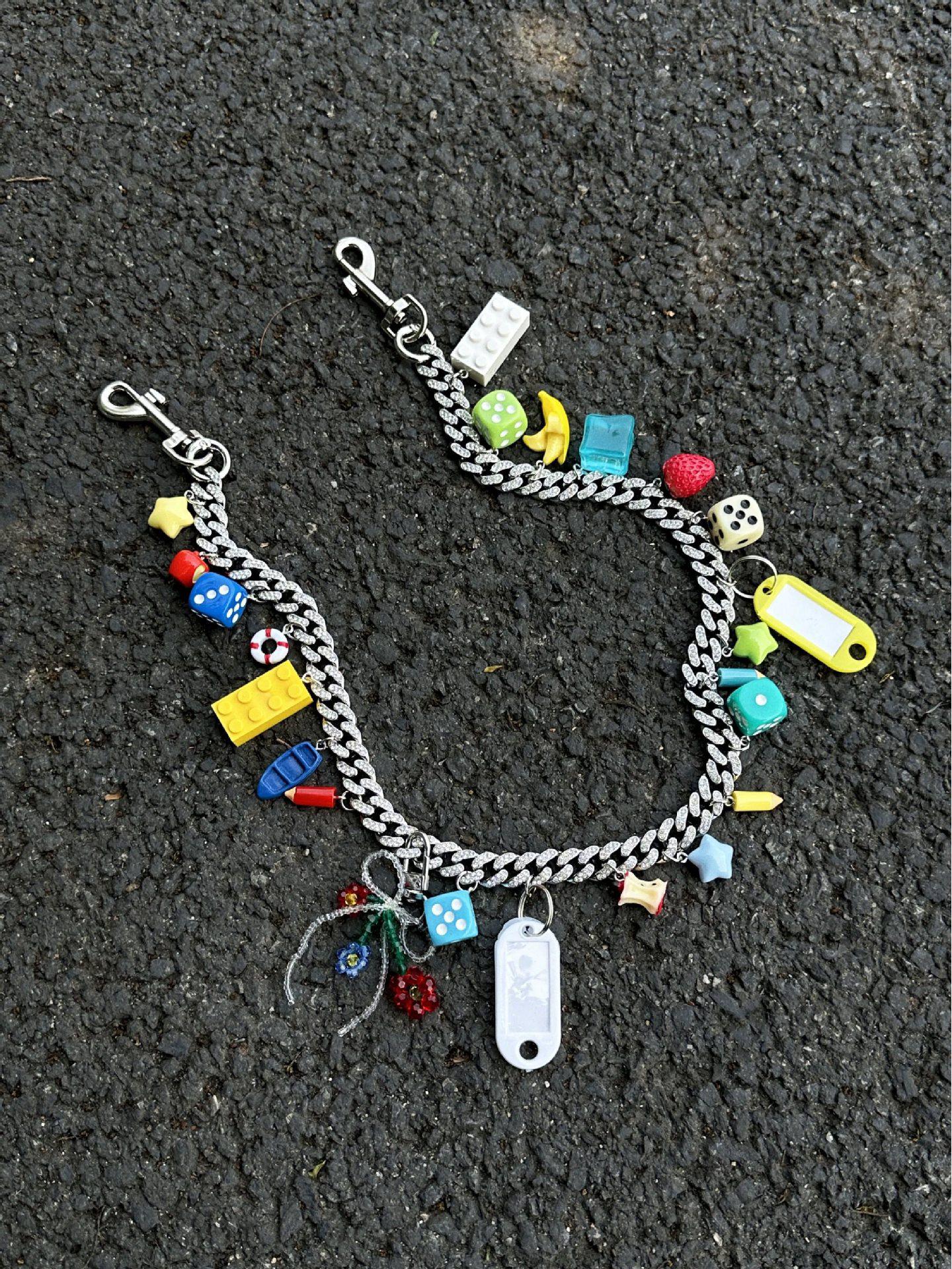 

Dopamine Element Diamond Inlaid Cuban Bag Chain Pendant