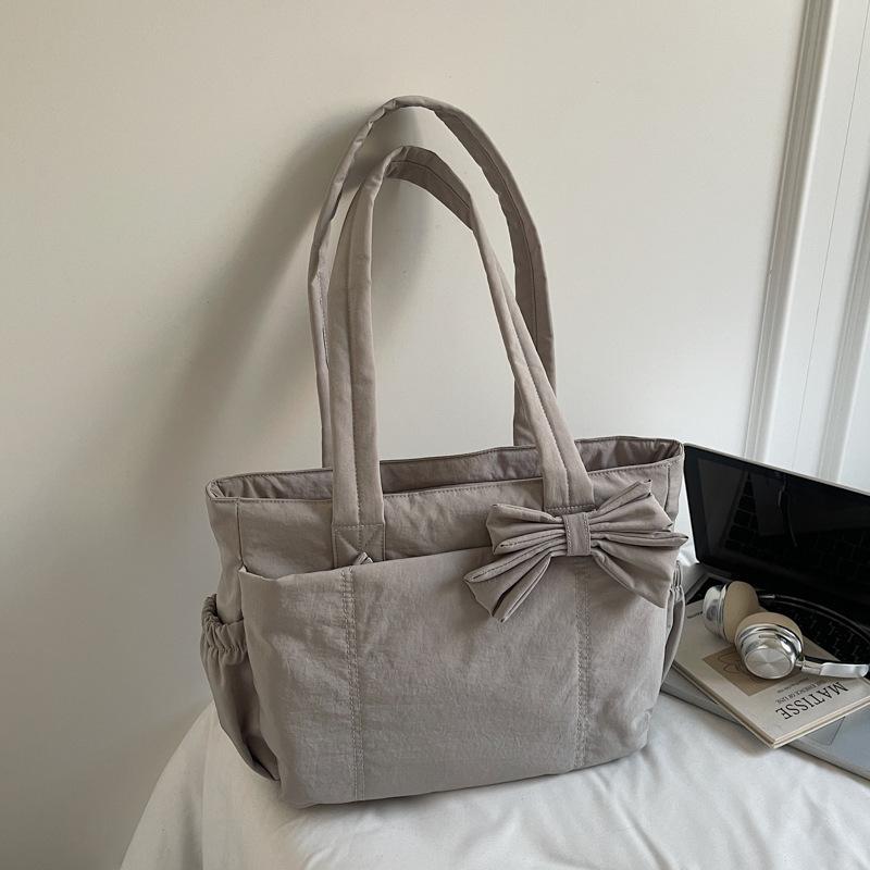 Bow tote bag for women, daily class commuting, versatile sweet girls simple and light handbag shoulder bag coffee color