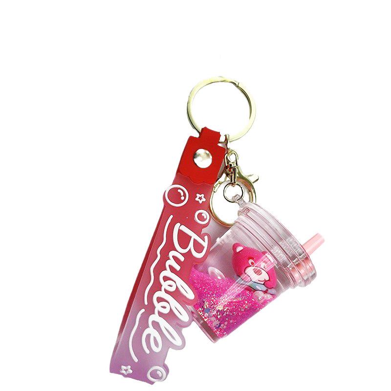 Strawberry Bear Doll Keychain with Colorful Oil-Filled Bottle and Milk Tea Cup Pendant