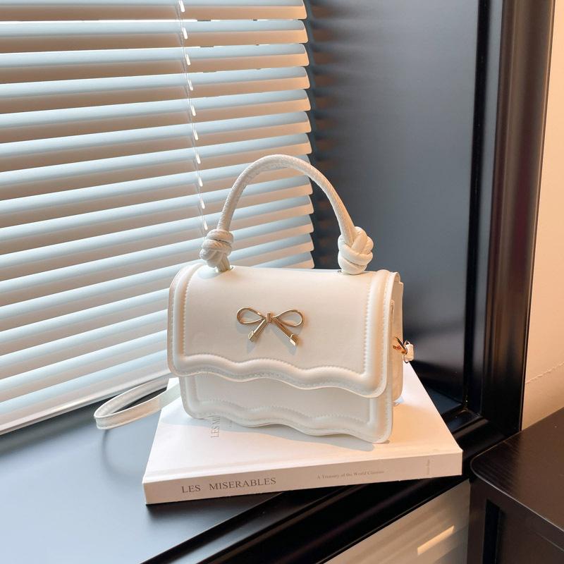 

Textured portable small square bag women s bag summer new light luxury shoulder bag commuter messenger bag білий