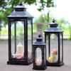 European Style Wrought Iron Hurricane Lantern Candlestick: Windproof Glass Holder for Home, Courtyard, and Wedding Decor.
