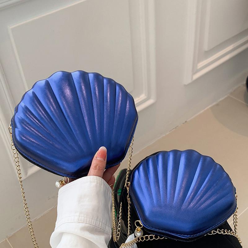 

Classic Yet Trendy Chain Strap Shoulder Bag With Soft Pu Material In Bright Shades Small синій