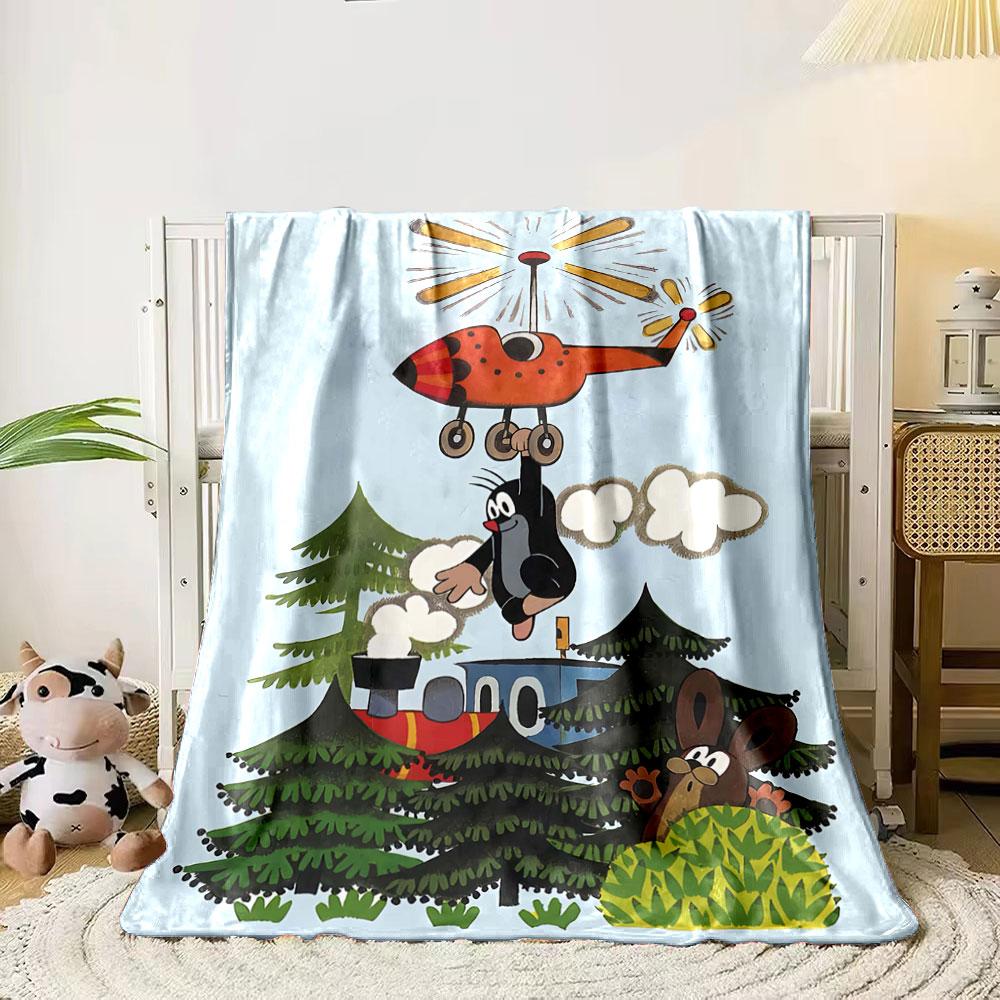 A mole hangs from a flying helicopter above trees, a rabbit, and a train. for all seasons blanket lunch break throw gift 80cm x 120cm