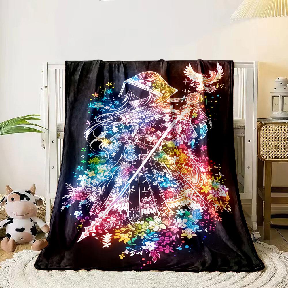 A vibrant, floral silhouette of a hooded figure with a phoenix. for all seasons blanket lunch break throw gift 80cm x 120cm