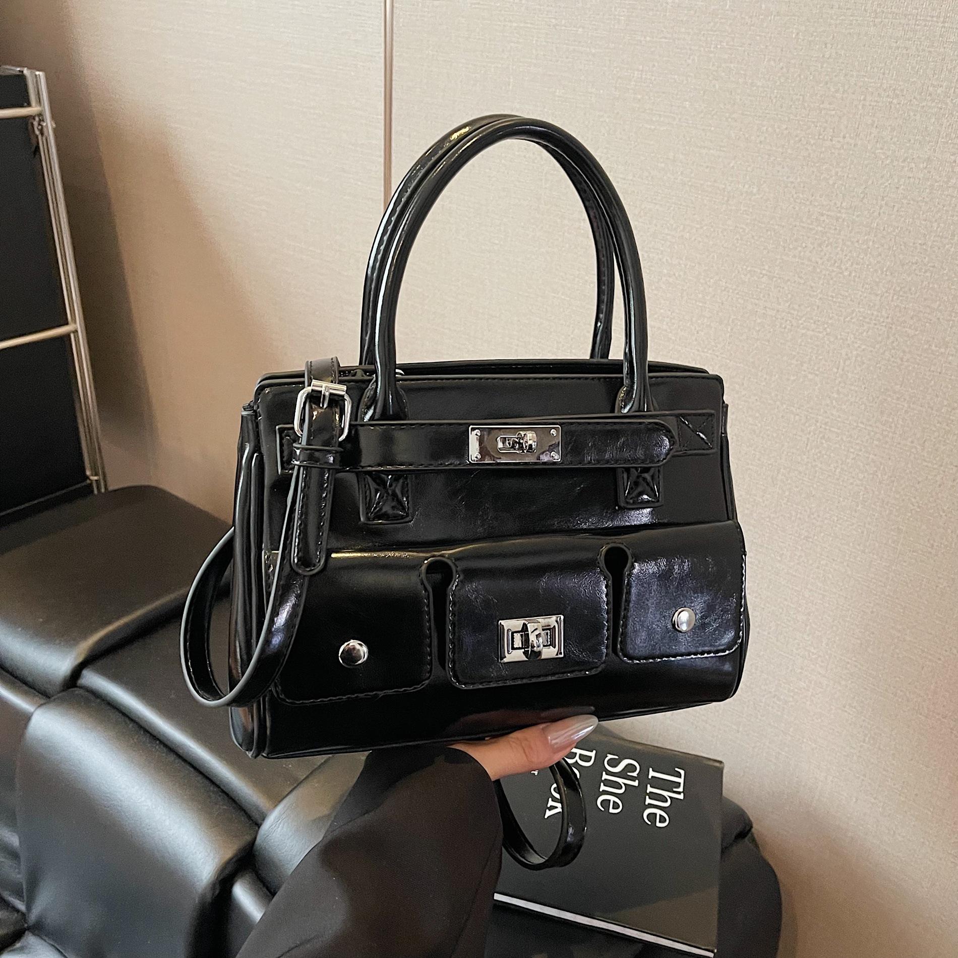 

Spring new fashion simple high-end handbag commuting literary temperament messenger women s bag чорний