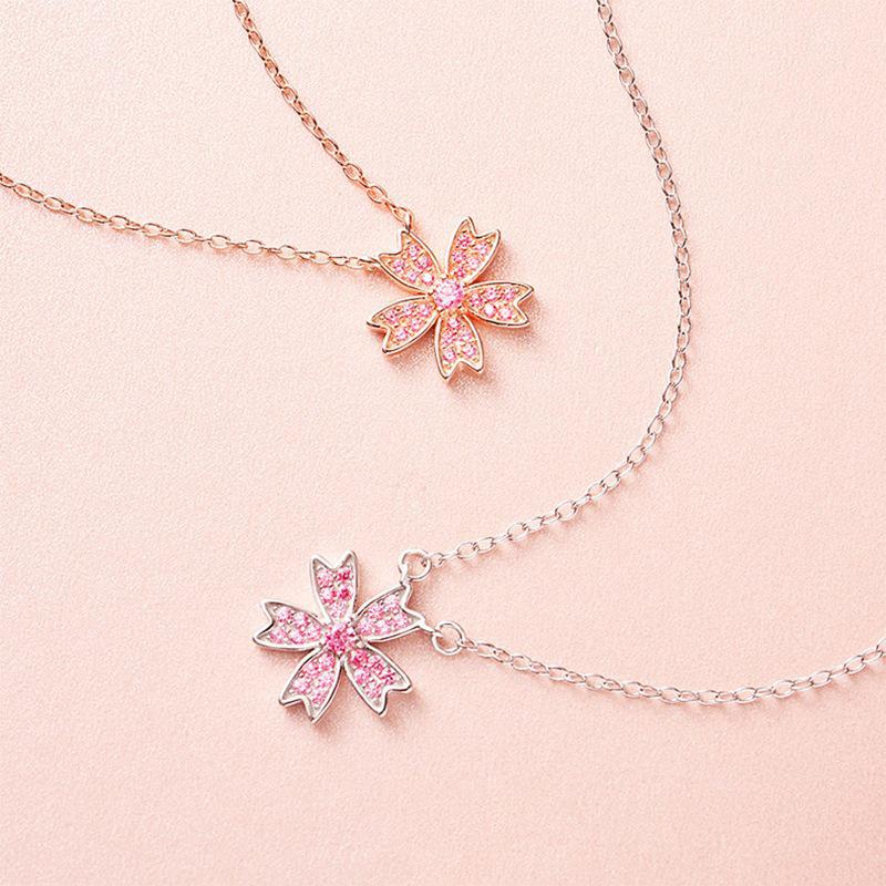 Sakura Flower Pendant Necklace: Women's Sweet Retro Zircon Clavicle Chain - Elegant & Stylish.
