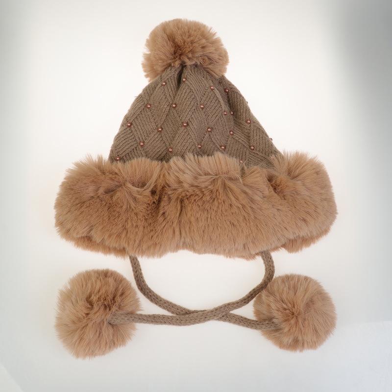 Winter Women's Knitted Hat with Beads and Fur Pom, Featuring a Velvet Lining, Large Fur Brim, and Warm Ear Protection.