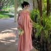This year, a beautiful French casual ramie pink neck dress is popular, and the small seaside photo clothes are super fairy.
