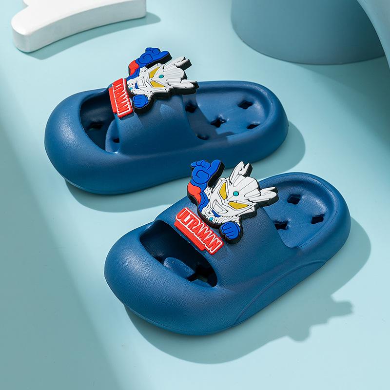

New Ultraman Tiga and Cerro children s slippers for boys, non-slip and leak-proof, suitable for bathroom use, hollow design for baby boys 220mm