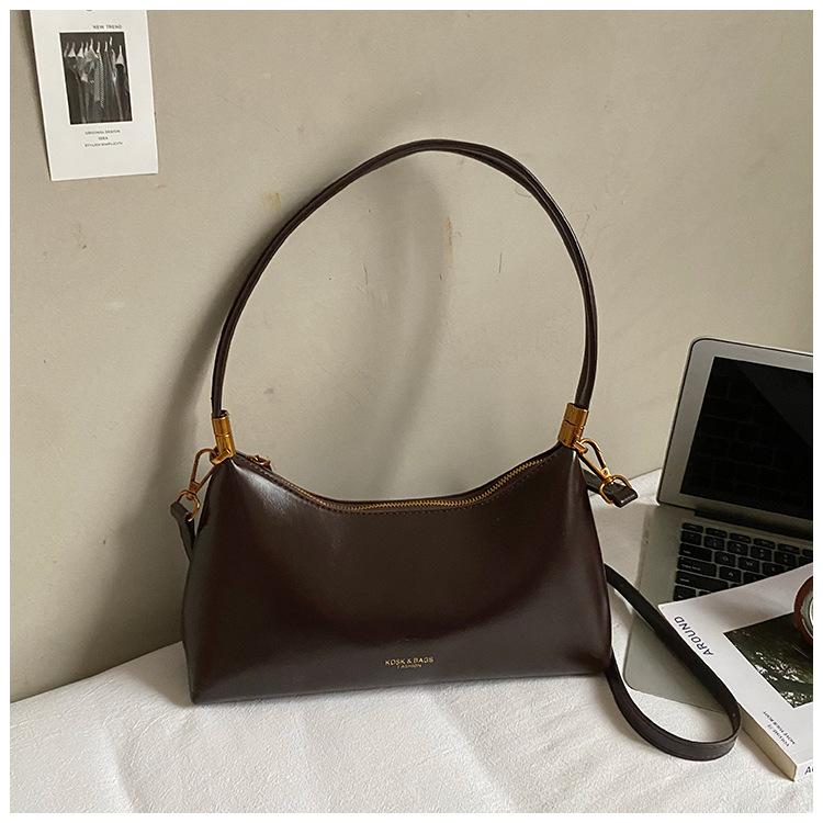 

Французская нишевая сумка подмышку в стиле легкой роскоши женская 2025 новая ретро сумка для通勤 из масляной вощеной кожи модная на плечо через плечо