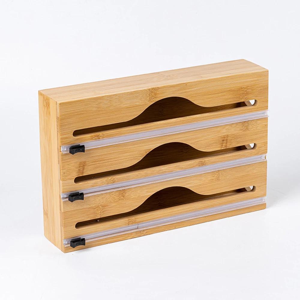 A wooden kitchen cling film dispenser, kitchen drawer aluminum foil and wax paper dispenser