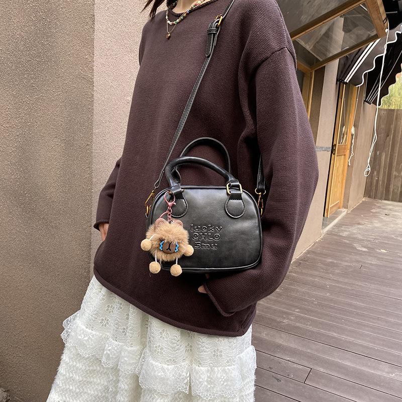 This year's popular versatile portable small square bag 2025 new fashion niche solid color shoulder messenger bag