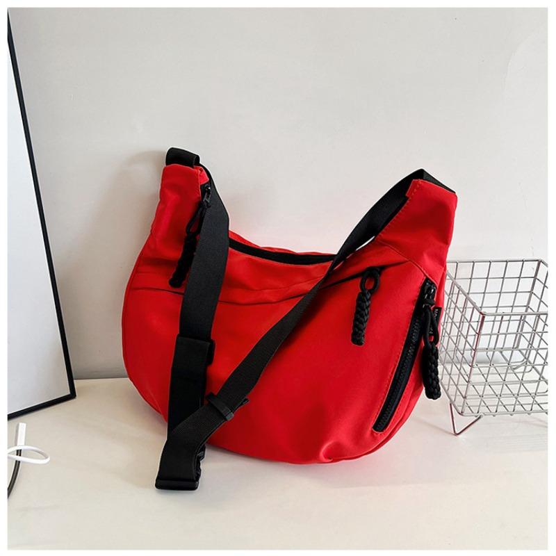 

Hot-selling trendy women s shoulder messenger bag, high-end and lightweight underarm bag, mini nylon dumpling bag.