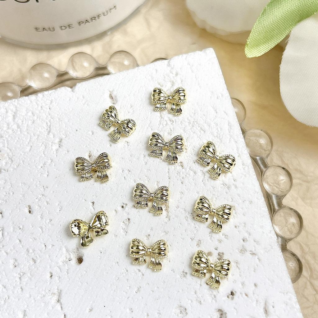 Acessórios para Nail Art Liga Mini Laço Fita Dourada Liga K Branca Decoração de Unha Simples Gravata Borboleta 3D