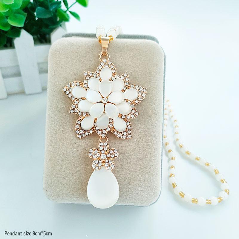 Damen Lange Blumen-Anhänger-Halskette - Elegante Wassertropfen-Pulloverkette für Herbst/Winter