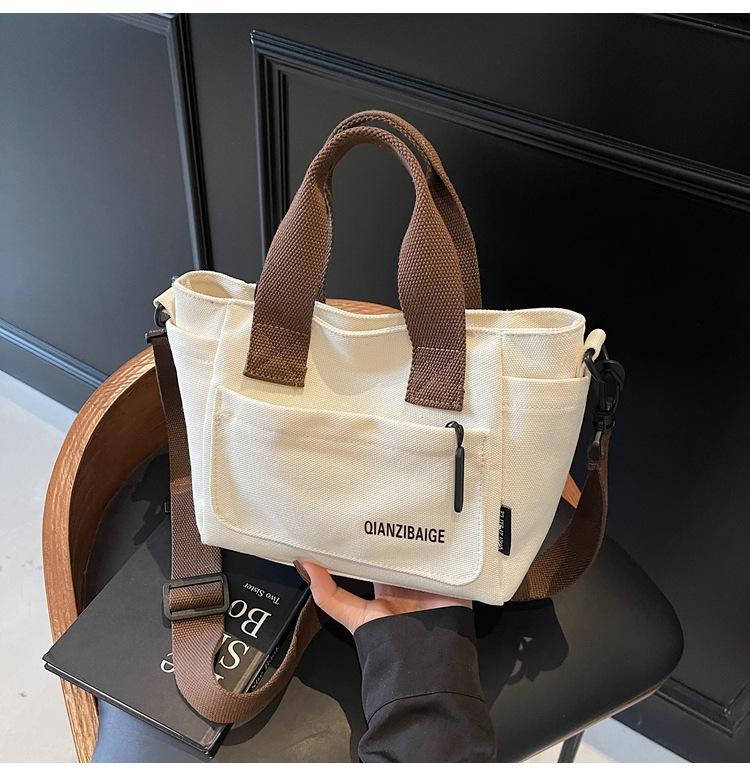 Stylish solid color simple commuter shoulder bag spring new niche casual lightweight messenger bag