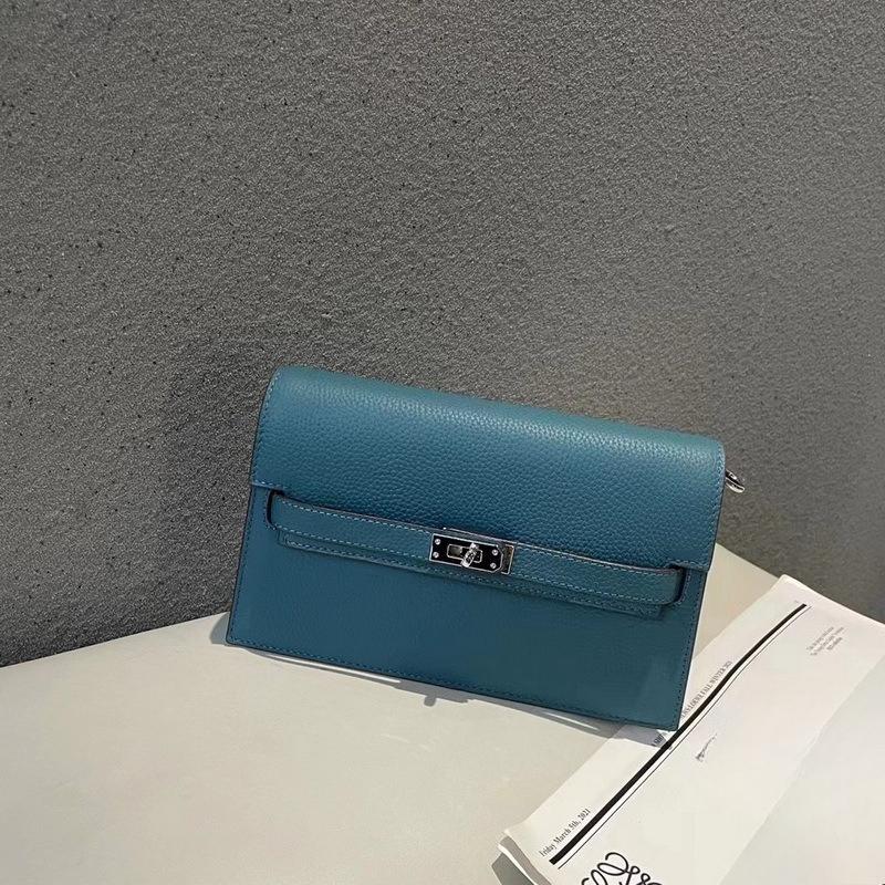 New lychee pattern leather half cover hand grab bag genuine leather women's bag single shoulder underarm bag oblique span bag wholesale
