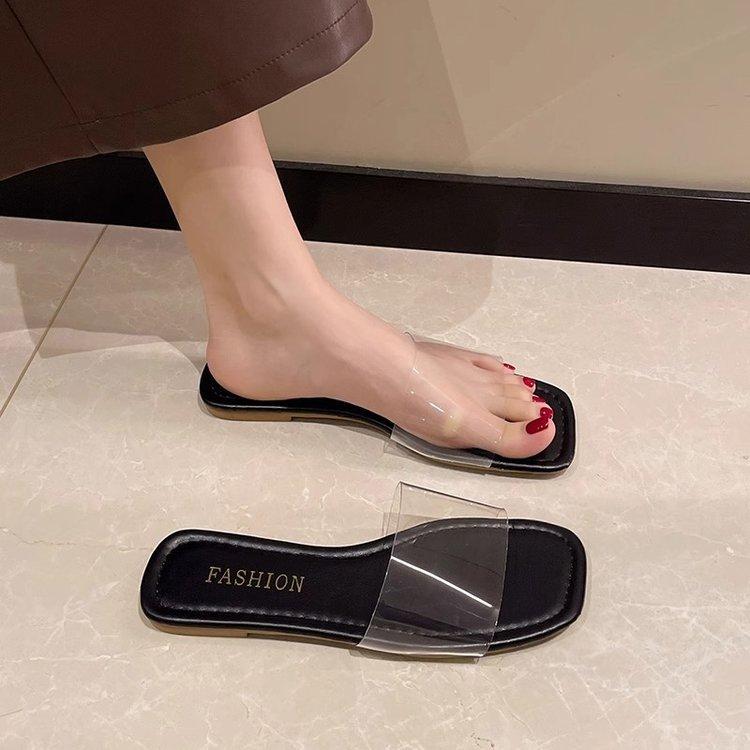 Xiaoxiangfeng Internet celebrity flat-bottomed slippers women's wear 2025 summer new versatile Korean version one-word transparent rhinestone slippers