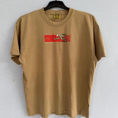 Vintage 90s Satori Movement Skateboards Tan T-Shirt – 2000s Skate Promo Graphic Tee with "Satori In Motion" Red Box Art