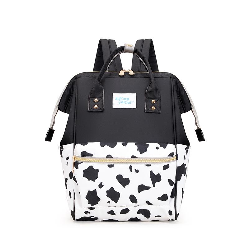 

Black & White Cow Print Multifunctional Mother and Baby Bag - Large Capacity, Lightweight, Fashionable Outing Bag