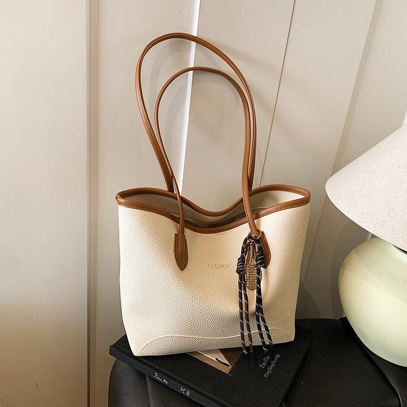 Popular retro bag women's large capacity 2025 new spring casual messenger bag portable bucket bag