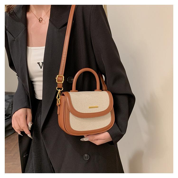 Borsa a sella portatile con texture premium da donna, nuova borsa a tracolla messenger retrò alla moda con inserti a contrasto di colore