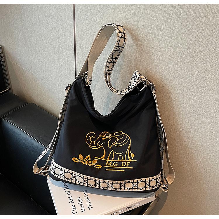 

Вышитая парусиновая сумка женская большой вместимости осенне-зимняя универсальная на плечо сумка-ведро многофункциональный рюкзак чёрный