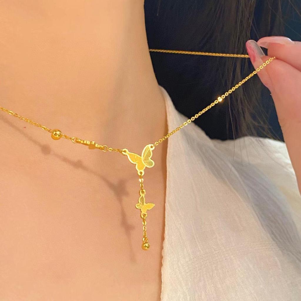 Golden Butterfly Tassel Necklace: Women's Versatile French Style, Elegant Niche Luxury Clavicle Chain.
