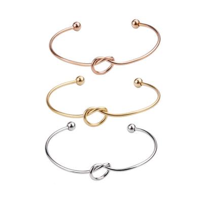 "Edelstahl-Liebesknotenarmband mit Pfirsichherz"