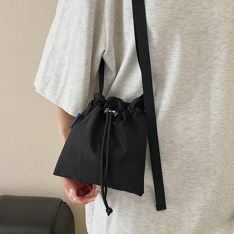 Spring and Summer Korean Ins Style Casual and Light Drawstring Mobile Phone Bag Niche Versatile Sports Travel Messenger Nylon Bag